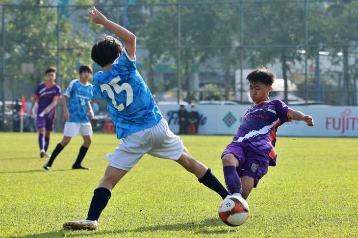 Bao giờ Bình Dương đưa cầu thủ sang Nhật Bản?- Ảnh 1. Giao lưu bóng đá ở Giải U13 quốc tế giúp các cầu thủ Việt Nam cọ xát thêm kinhh nghiệm - Ảnh: BTC
